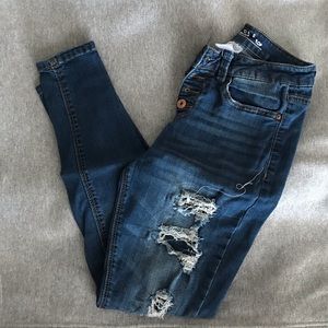 Faux ripped skinny jeans
